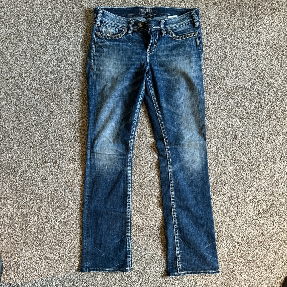 Silver Jeans Co. “baby boot” mid-rise jean with studded pocket details